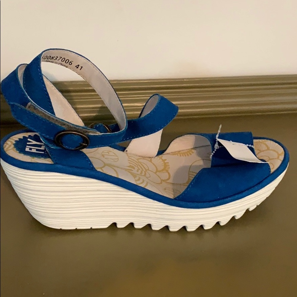 FLY London’s Wedge Wrap Sandals in blue suede.